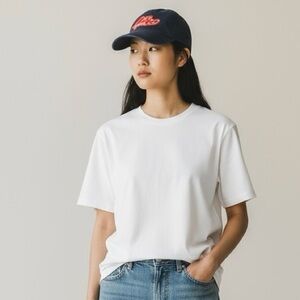 NIKE · WOMEN'S NAVY BLUE + ORANGE HERITAGE86 CAP